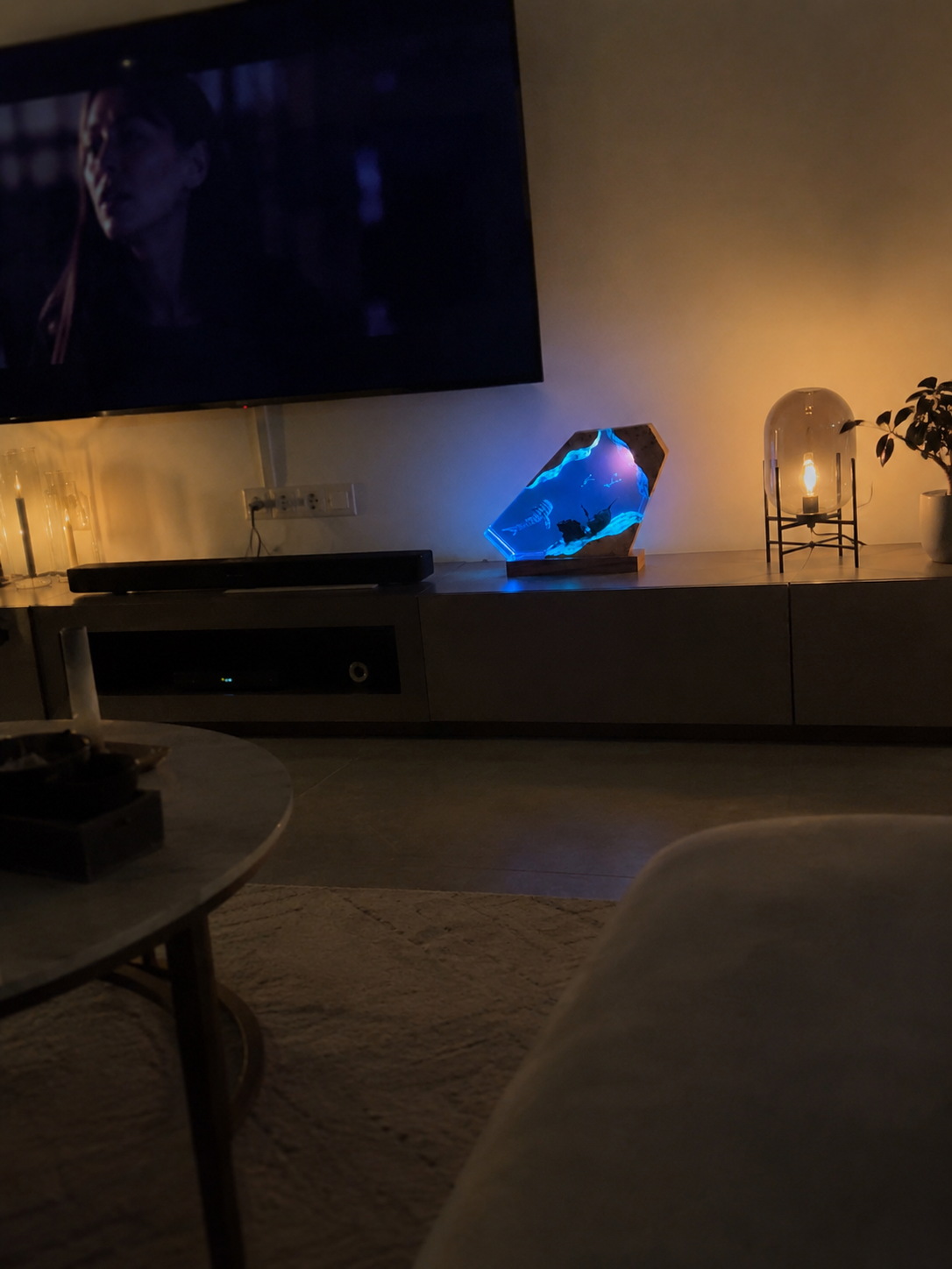 Ocean resin artwork displayed in a collector's living room